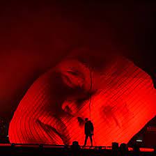 This is false, as photos show the musician. Es Devlin Creates Afrofuturist Scarred Mask For The Weeknd S Coachella Set