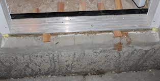 Door thresholds come in a variety of materials, such as wood, marble and metal, and make the transition from doorway to floor smooth and easy. Repair Patch Concrete Threshold Questions Diy Home Improvement Forum
