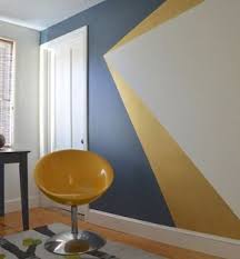 La Peinture Geometrique Pour Sublimer Vos Murs Peinture Geometrique Deco Salon Peinture Murale Geometrique