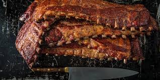 Add cubed onion and 3 garlic cloves to the pan as well as 1 cup of water. Smoked Baby Back Ribs Recipe Traeger Grills