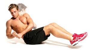 Contracting your abs, twist slowly from your torso to your right and touch the medicine ball to the floor beside you. Russian Twist Exercise Guide Build A Strong Core With The Russian Twist