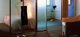 This modern coat rack design made from black walnut wood is both stylish and functional. Which Design Coat Rack You Should Choose For Your Home