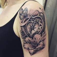 Butterflies flowers and hearts tattoos. Heart Compass Tattoo On Arm With Butterfly And Flower Armtattoosmeaning Trendy Tattoos Sleeve Tattoos Body Art Tattoos