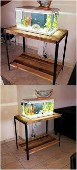 this is a low heighted bottom designed handsome creation of wood pallet aquarium stand this whole creation is finished with the palet mobilya mobilya akvaryum
