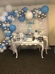 The use of balloons to adorn a baby shower room is one of the easiest and most popular methods of decoration out there today. Boy Baby Shower Baby Shower Balloons Blue Baby Shower Decorations Baby Shower Decorations