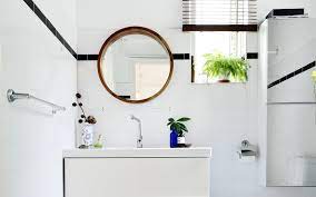 A skirt for the sink provides extra storage underneath, and the pages of an old book are taped to the wall for inexpensive and effective decoration. Small Bathroom Designs For Indian Homes To Use All The Space Beautiful Homes