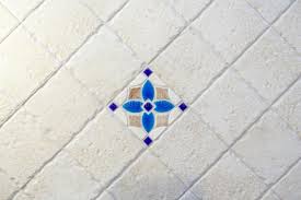 As you can see in the before image, the floor was very scratched and worn. Beautiful Beige Tiles With Uneven Edges Are Laid Out Diagonally Background In The Center Is A Tile With A Blue Floral Pattern Stock Photo Image Of Marble Square 172606148
