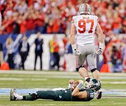 College Football Week 15 In Photos Ohio State Football Ohio State Ohio State Wallpaper