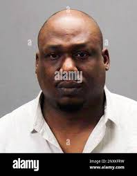 In a booking photo provided by the Oakland County Sheriff, Vernest Griffin  in shown. The suburban Detroit man has been charged in connection with one  of two fatal shootings at separate businesses.