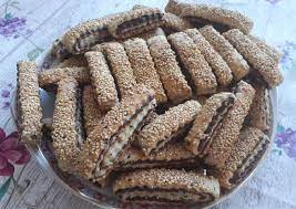 مقروطة التمر المغلفة بالسمسم بالصور من وصفات أم أنس recipe arabic food desserts recipes