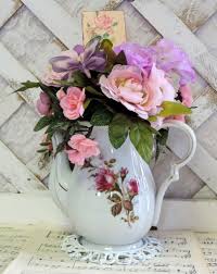 Maybe you would like to learn more about one of these? Vintage Shabby Rose Teapot Silk Floral Arrangement Centerpiece