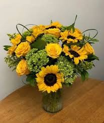 While collecting the flowers prefer the long stem flowers so that you can easily tie up all of them together. Sunflower Fields By Floral Expressions