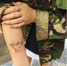 The socialite posted an instagram carousel of the moment with the caption, i tattoo. the first image pictures the couple seated at a table as kardashian takes a tattoo pen to barker's right forearm. One Love Tattoo 20170805 Mia Instagram Map Galuxsee