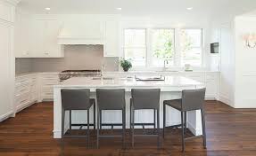 white kitchen cabinets with gray subway