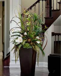 We strongly recommend replanting the starter pot into a larger, more decorative planter or straight into the ground. Magnolia Masterpiece Silk Arrangement Large Flower Arrangements Tall Flower Arrangements Silk Flower Centerpieces