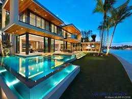 Contemporary Miami Beach Luxury Waterfront Home By The Aquablue Group 10 050 Square Feet Of Open Plan Living Spa Mansions Luxury Miami Houses Waterfront Homes The houses in the village in all categories. miami beach luxury waterfront