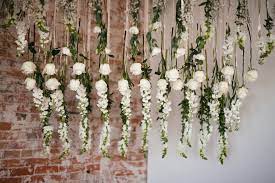 We've seen it all—wheat walls, flower walls. Hanging Flowers Lace And Lilies Blog