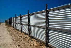 What the framing between the posts would look like to attach the metal panels to. Corrugated Metal Fence Stock Image Image Of Material 13092767