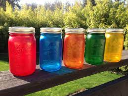 Stained Glass Looking Mason Jars That I Made Super Easy To Do I Mixed Food Coloring With Mod Podge And Used A 1 Pa Mason Jar Crafts Jar Diy Mod Podge