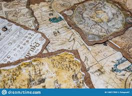 Old Nautical Charts Laid Out On The Table Stock Image