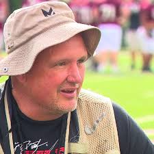 Beloved Owen High assistant coach honored with surprise theme night ahead  of retirement