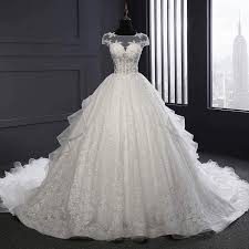 Check out our curated selection of wedding dresses, with most styles are under $100! 2018 Ivory Lace Ball Gown Wedding Dresses V Back Cap Sleeve Lace Up Bridal Dress Sold By Bella S Boutique On Storenvy