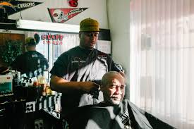 Men's hairstyles keep getting longer. In Photos Barber And Beauty Shops Are Centers Of Community In Sprawling Whitehaven