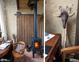 Poele A Bois Jotul Dans Le Jardin D Hiver De La Maison D Hotes La Maison D Hector Maison Maison Et Appartement Poele A Bois Jotul