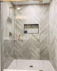 This bathroom redesign includes large scale porelain marble look tiles, underfloor heating, concealed storage drawers and features a chevron floor tile. Gallery Bathroom Shower Walls Bathroom Interior Design Bathroom Interior