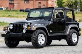 Image result for Brilliant Black 2005 Jeep
