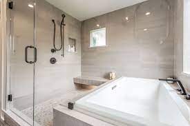 Tub Enclosed In Shower Area In Modern Farmhouse Bathroom Designed By Olamar Interiors Modern Farmhouse Bathroom Corner Tub Shower Combo Corner Tub Shower
