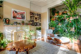 Install a couple of floating wall shelves and style them with potted plants. Vertical Gardens Are The Perfect Small Space Solution For Plant Lovers Martha Stewart