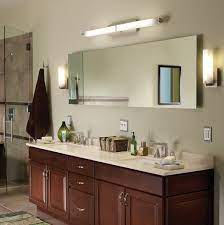 Brighter bathroom lighting makes precision tasks, like applying makeup and shaving, easier and installing a combination of bathroom light fixtures, including wall and ceiling lights, will reduce shadows cast across your face. How To Light A Bathroom Bathroom Lighting Ideas Ylighting