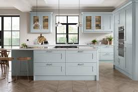 White egg shaped light pendants hang above a light blue center island topped with a honed white marble countertop seating sleek counter stools. Duck Egg Blue Kitchen Cgi Ronen Bekerman 3d Architectural Visualization Rendering Blog