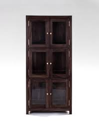 Natural wood bar cabinet with storage compartments for wine spirits and glasses Buy Dining Room Cabinets Online In India Fabindia Com