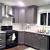 Modern White Kitchen With Black Appliances