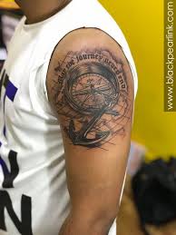 It includes a dotted compass with the directions, and in the middle is a big anchor tatted in grey and black and a rope running across. Best Compass And Ship Tattoos For Sailors And Travelers