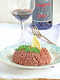Quindi portare a cottura aggiungendo del brodo e in ultimo sfuamre con l'amarone (circa un paio di biccheri); Risotto All Amarone E Scorci Di Verona Viaggiare Come Mangiare