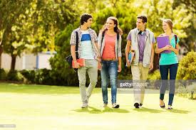 Full Length Of Happy College Students With Books And Files Walking On College Advice College Photography Student