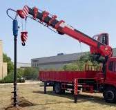 The truck-mounted crane is equipped with an auger drill to make drilling  construction operations more efficient. The 8-ton crane has a boom length  of 18.6 meters and a lifting height of 21 meters. ...