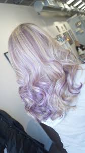 This blonde purple hair color job takes hair from a platinum root with tinges of lavender down to pastel purple ends in a perfect, easter egg shade. Lavender Highlights With Blonde Hair Purple Blonde Hair Hair Color Purple Purple Highlights Blonde Hair