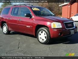 Image result for Medium Red 2003 Envoy