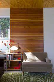 For a basement room or home bar, consider wood wall paneling. 20 Rooms With Modern Wood Paneling