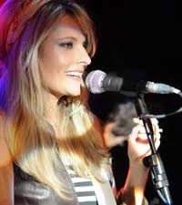 Elizabeth Cook Plays 'Welder' with Dwight Yoakam + More