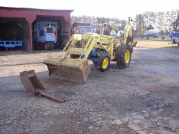 Image result for Yellow 1972 Tractor