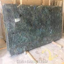 Due to their veining, rocky patterns and uniqueness these granite slabs have a strong and well defined personality. Labradorite Green Granite Lemurian Blue Wall Tiles From China Stonecontact Com