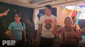 EJ Obiena reunites with security guard in his homecoming at UST