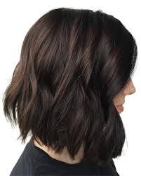 Blue tones are flattering for most complexions, and they put a trendy spin on a traditional approach to highlighting hair. 23 Flattering Dark Hair Colors For Every Skin Tone