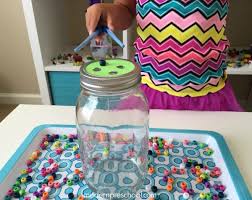 Not only do you (as an adult) get to enjoy a bottle of wine but your kids can create some awesome art projects to show off! Bead Drop Fine Motor Jar