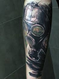 Sad face tattoo along with a happy face tattoo usually in a mask form means laugh now, cry later. Illustrative Style Colored Gas Mask Tattoo On Forearm Tattooimages Biz